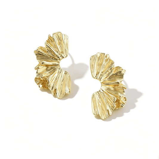 Ever P. sculptural gala jewelry style earrings with an oversized architectural silhouette.