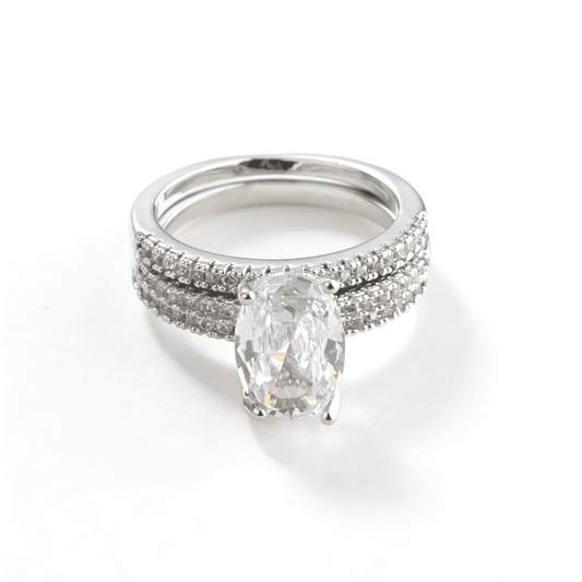 Detailed view of the three-piece stackable rings, showcasing the pavé setting and high-polish finish.