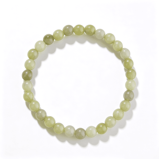 The circular alignment of the adjustable Lime Dew agate bracelet against a bright background.