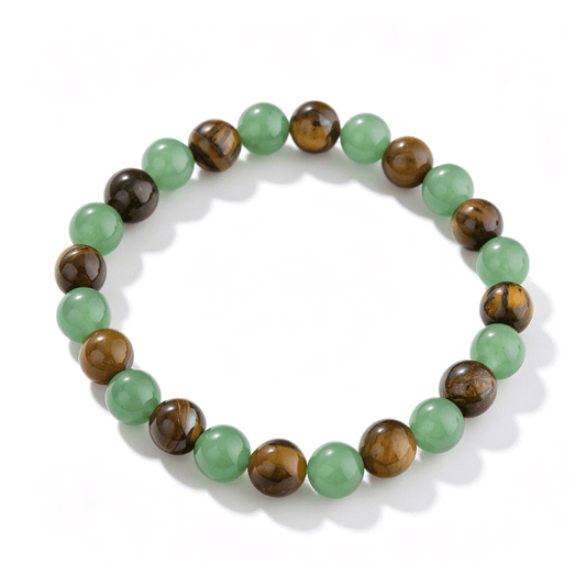 Close-up of 6.5mm brown green strawberry quartz beads showing natural mossy inclusions in an Ever P. beaded bracelet.