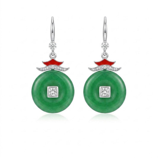 Ever P. Chinese jewelry featuring gold dangle earrings with a red donut amulet disc.