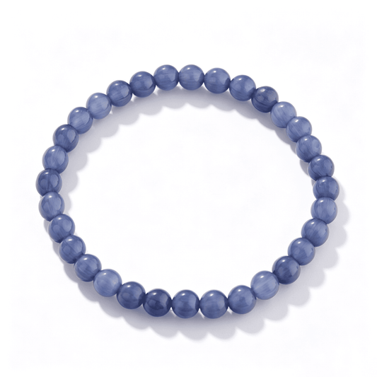 A full view of the Indigo Wave crystal bracelet showcasing deep indigo and violet tones.