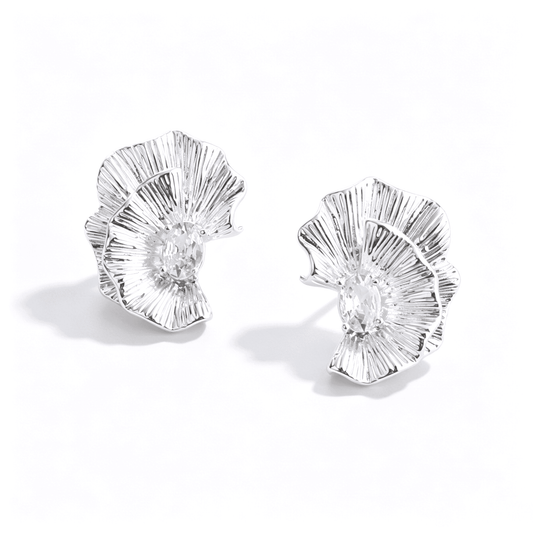 Lifestyle view of the Ever P. silver flower earrings, showcasing the 2.5cm size and elegant fit.