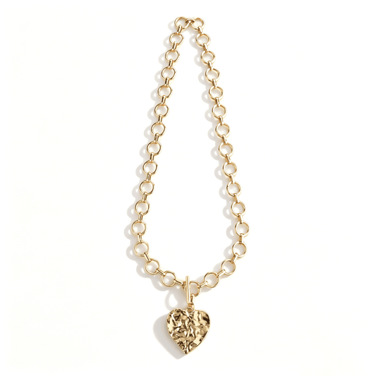 Ever P. textured gold heart pendant necklace, featuring a distinctive raw, hammered surface design.