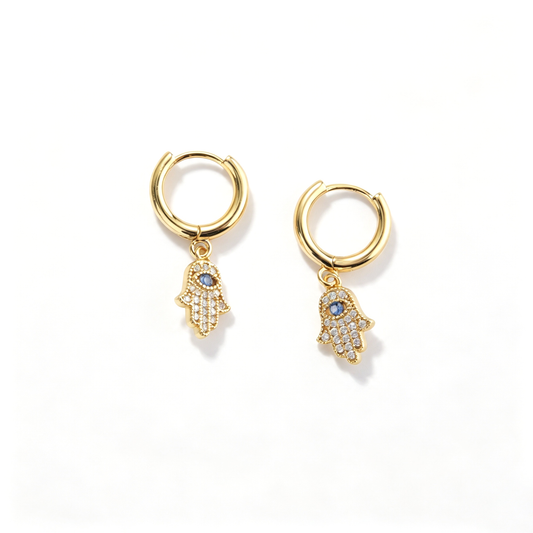Pair of hamsa hand earrings showing matching hoop silhouettes and dangling charms