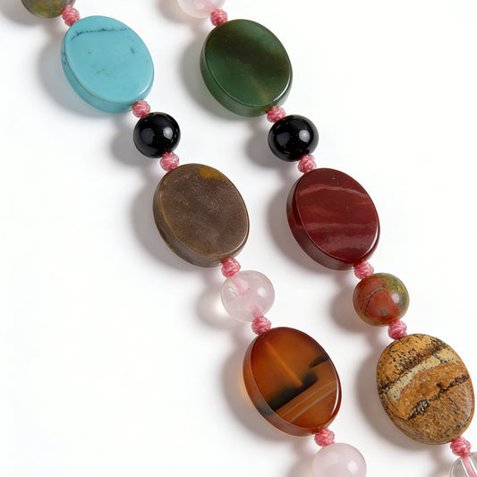 A model wearing the 55cm long beaded necklace made of vibrant natural gemstones.