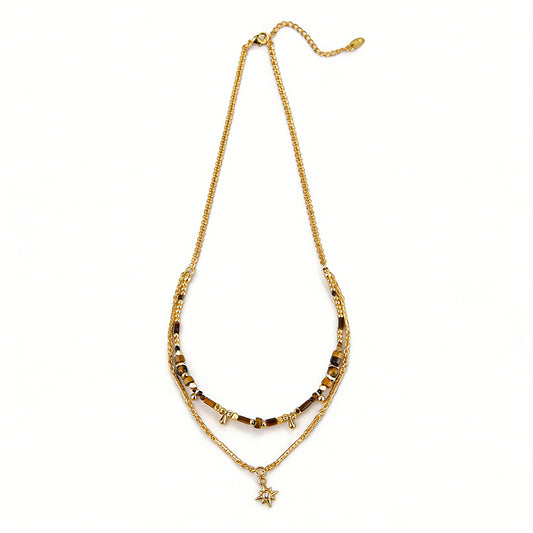 Close-up of natural stone bead necklaces showcasing the chatoyant effect of tiger eye.