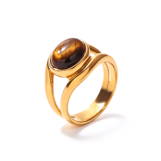 An oval centerpiece ring photographed upright from the front at a slight angle.