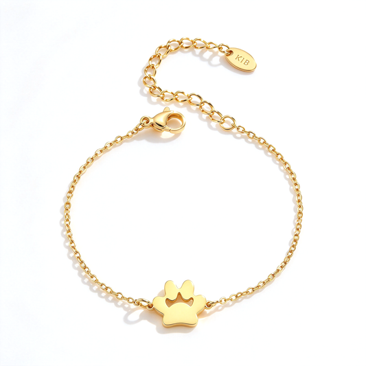 Single paw charm bracelet displayed in a circular shape with the chain and clasp visible.