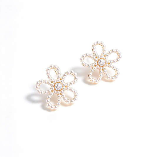 Angled view of the flower stud earrings highlighting the layered petal design.