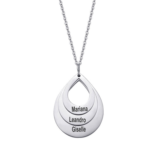 Silver-tone necklace showing the open teardrop pendant and custom name lettering from the front.