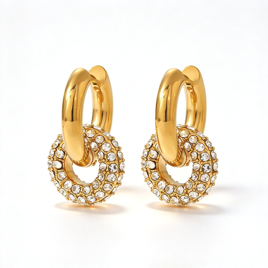 Gold-tone hoop earrings with clear decorative accents shown from the front.