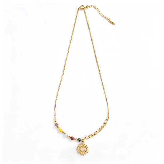 Full-length vintage sun pendant necklace with asymmetric colorful bead and mixed-link details.