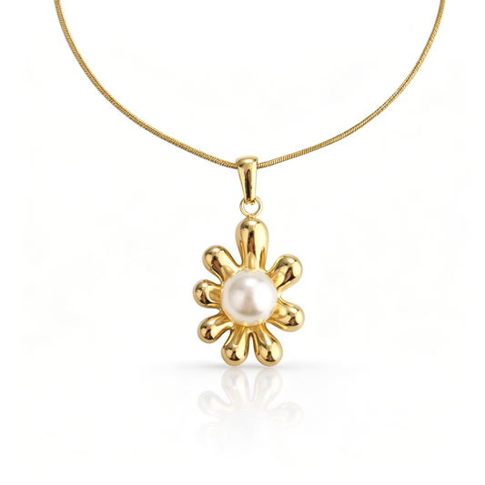 Front view of a polished 18k gold-plated floral pendant with smooth petals and a central pearl.