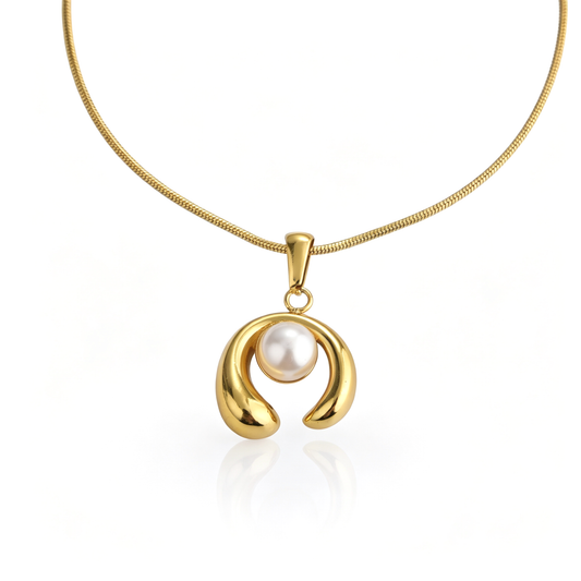 Frontal view of a polished 18k gold-plated open-arch pendant with a lustrous white pearl.