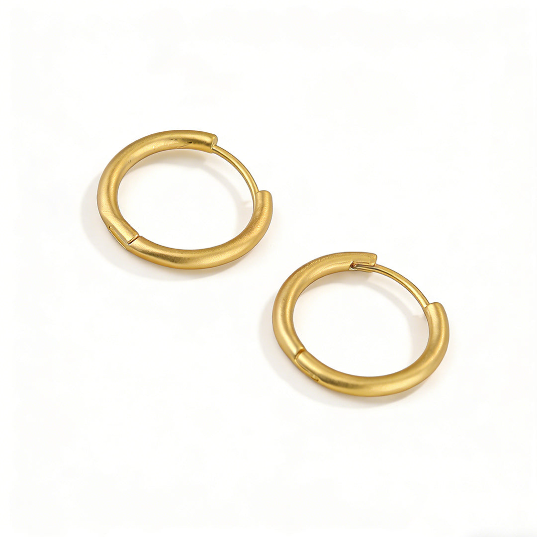 18K gold plated earrings in a small hoop silhouette, tarnish-free and radiant.