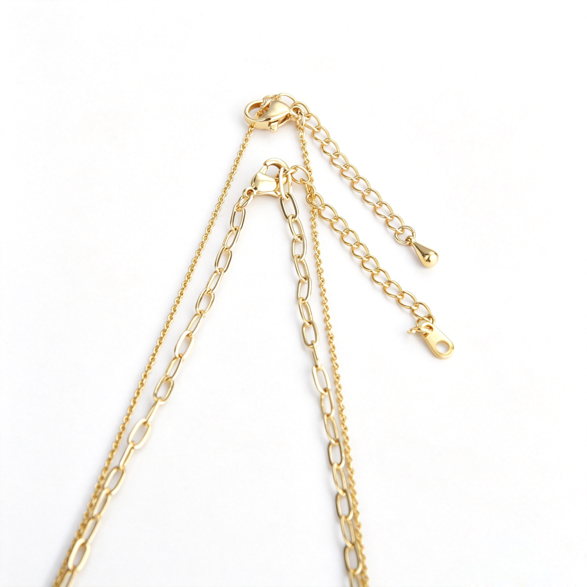 Close-up view of 2.64cm textured gold cross pendant with bamboo-style details