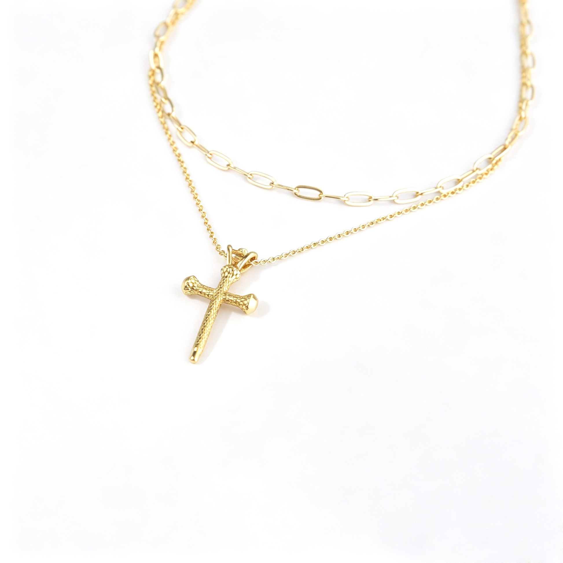 Two-piece gold necklace set with paperclip choker and long cross chain