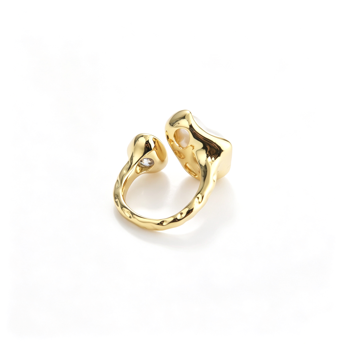 Underside perspective showing the open band structure and setting backs of the gold-plated ring.