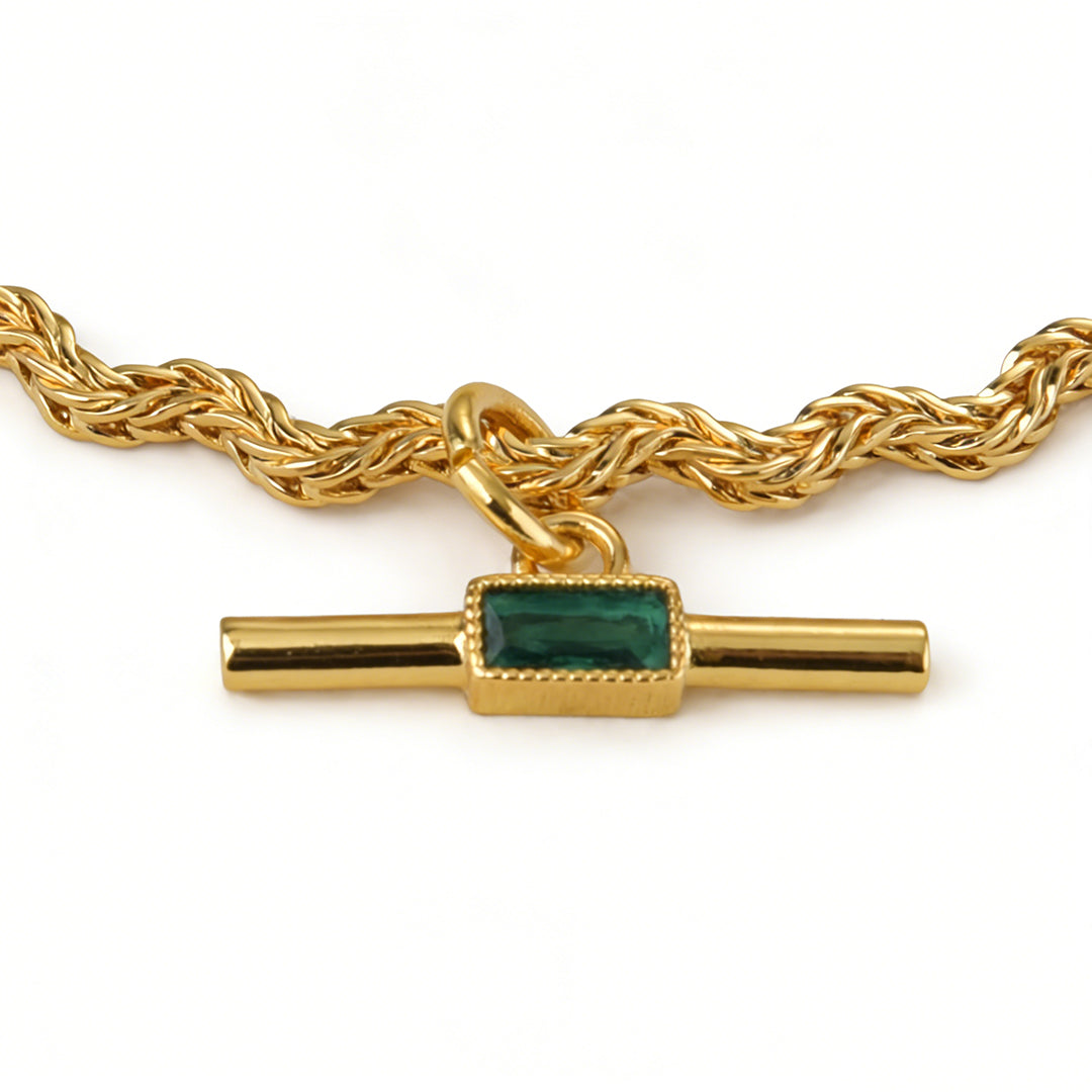 18k gold plated necklace featuring a radiant green crystal pendant.