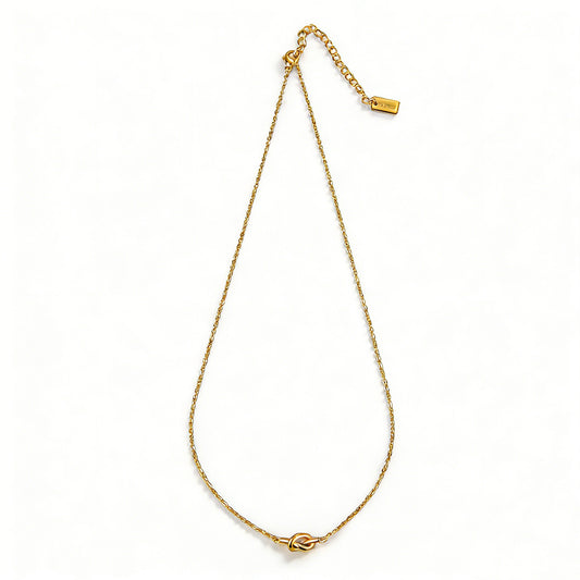 18k gold plated necklace featuring an organic hammered metal texture.