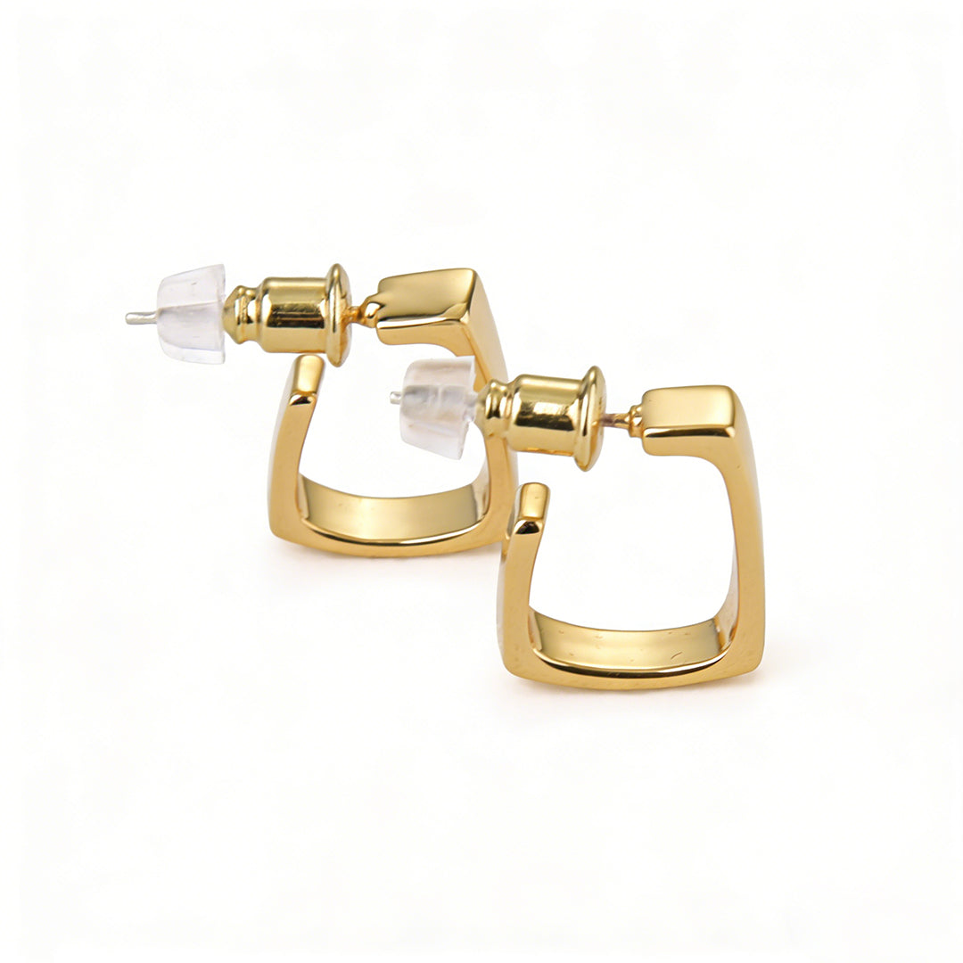Modern 3D cube gold stud earrings with a high-polish finish, minimalist statement jewelry.