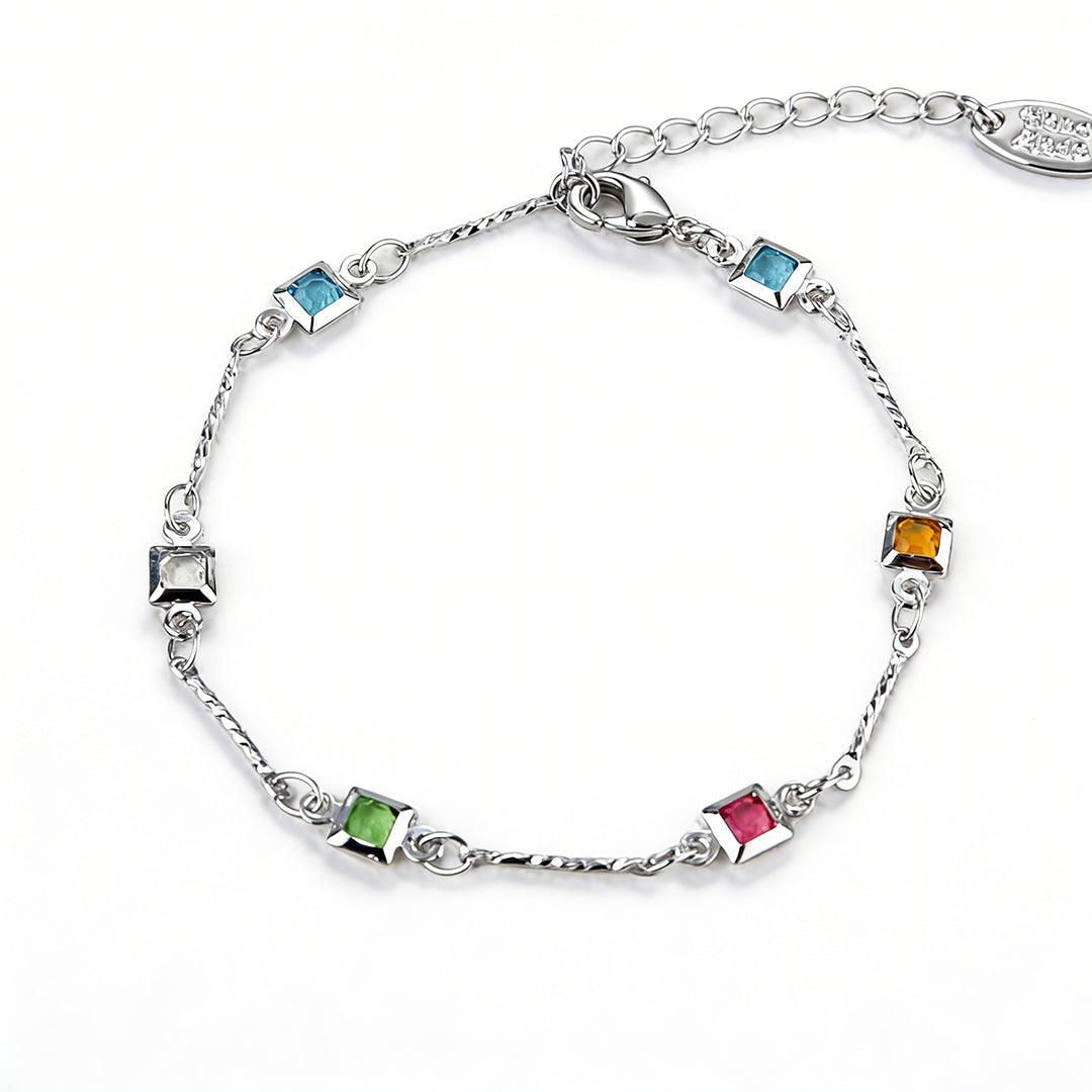 Adjustable 15cm to 18.5cm CZ bracelet in a radiant white gold tone for petite wrists.