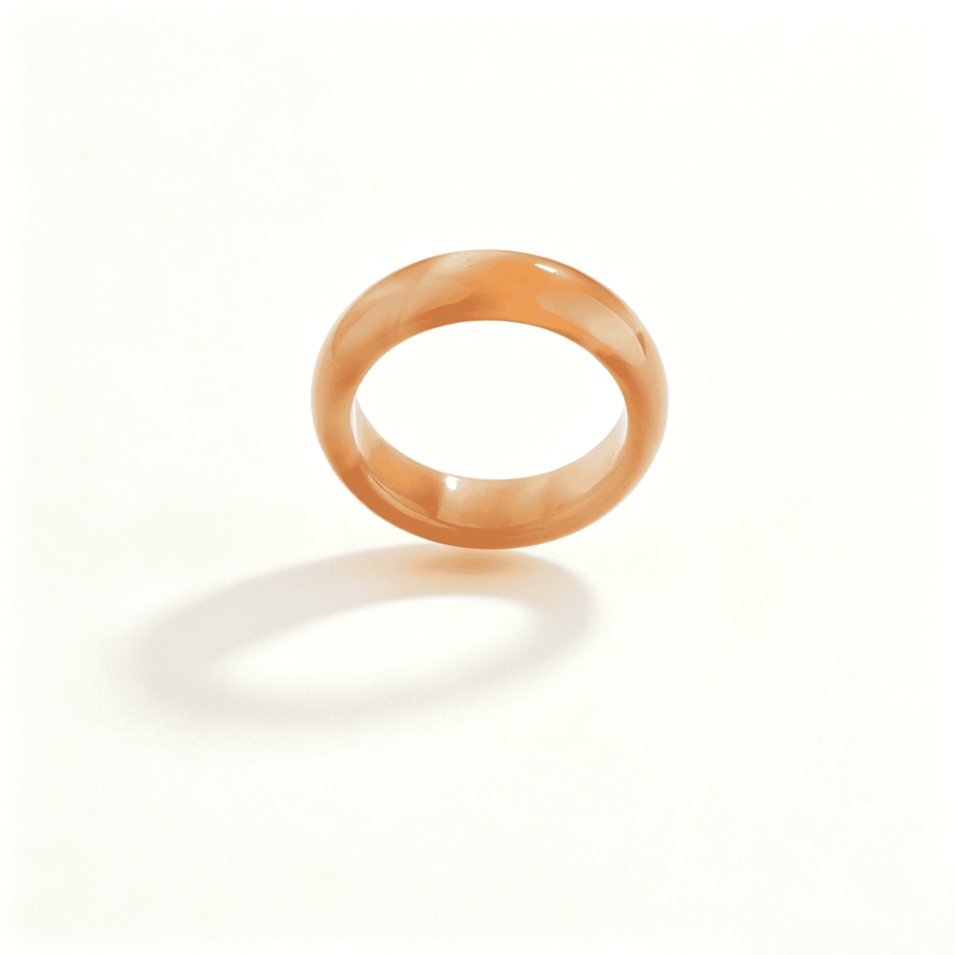 A natural amber chalcedony ring by Ever P. featuring a translucent honey-colored agate band with a smooth polished finish.