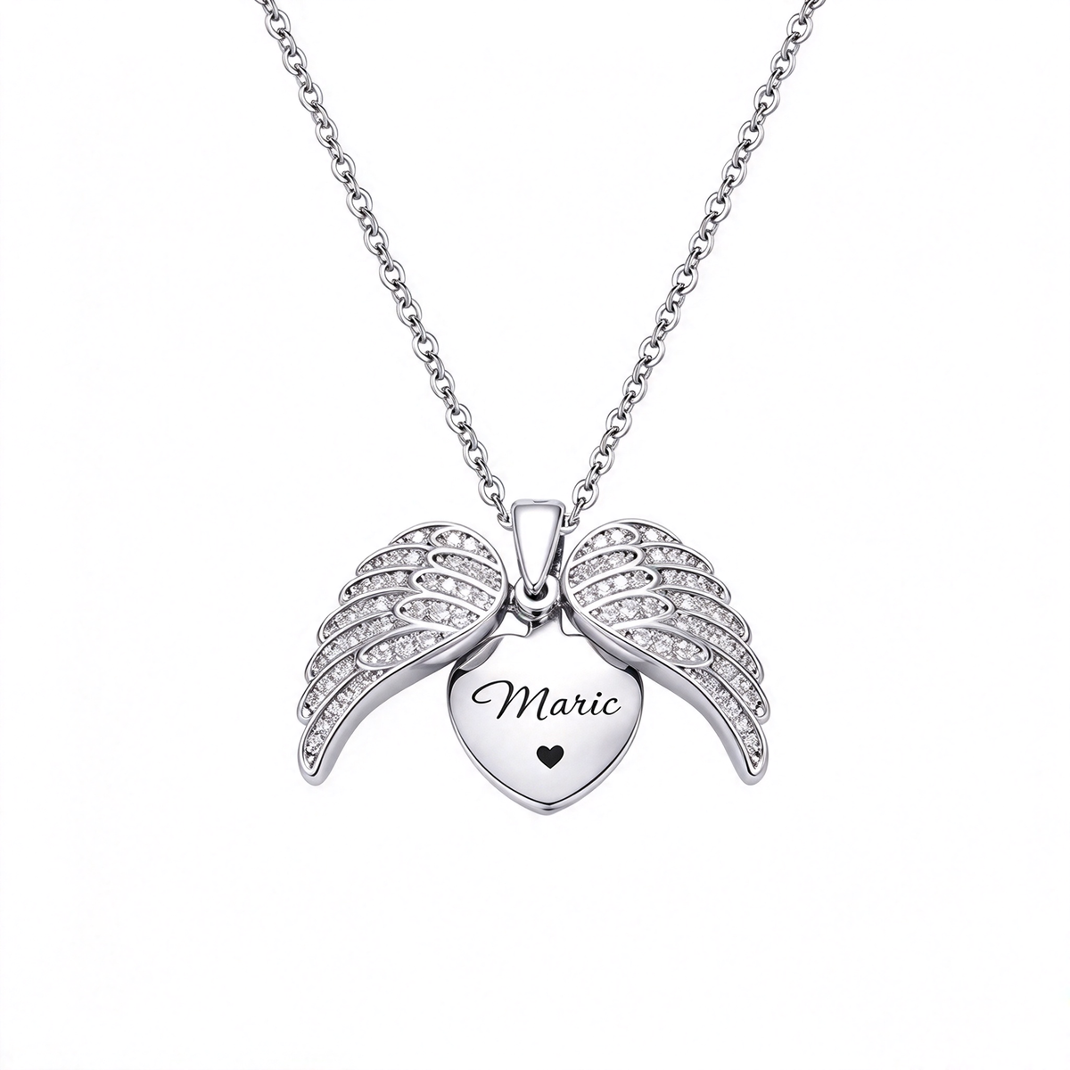 Silver-tone heart pendant framed by decorative angel wings with engraved lettering.