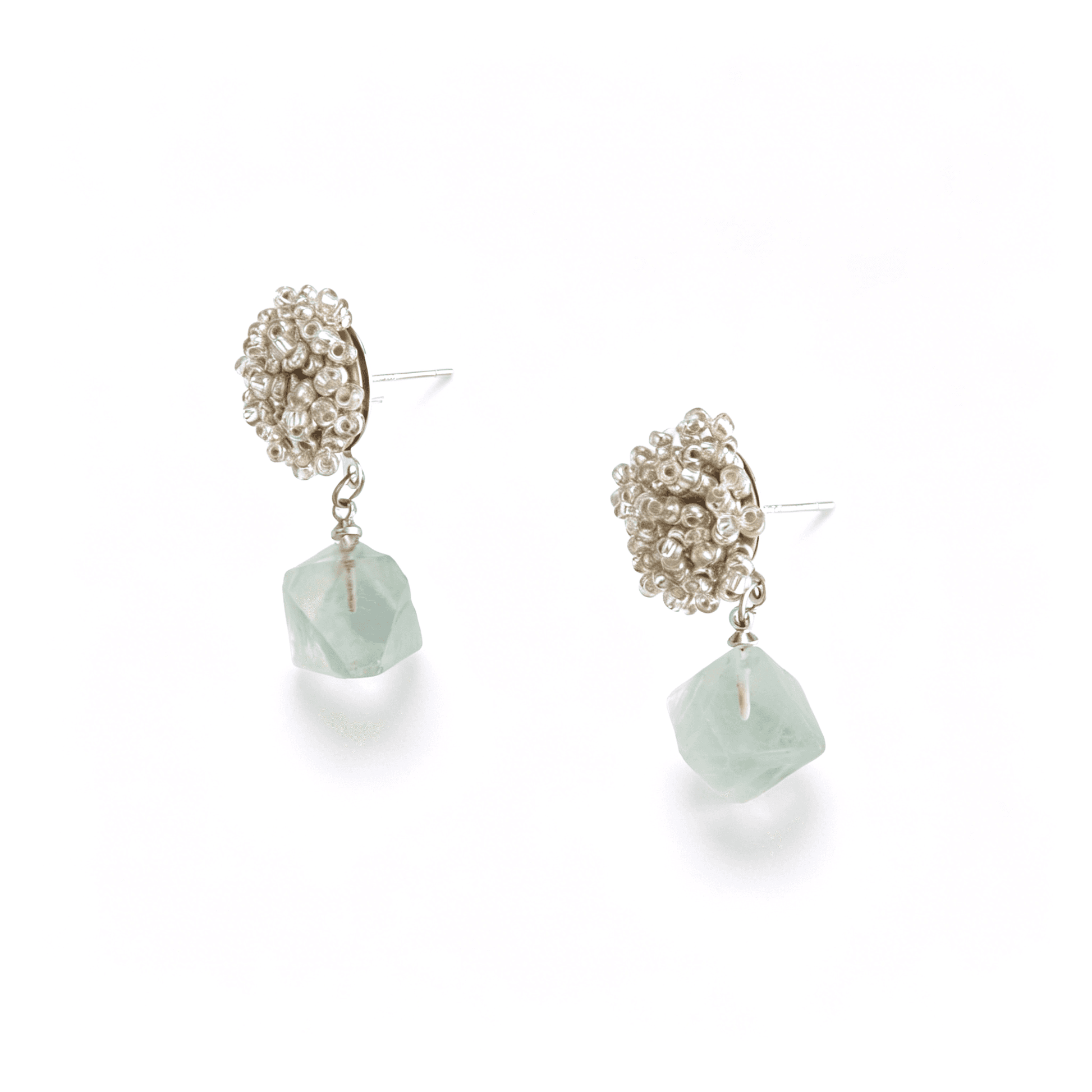 Front studio profile of the silver beaded top green aventurine drop earrings showcasing the faceted geometric crystal charms.