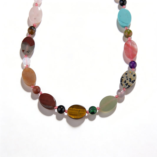 Ever P. beaded wrap bracelet featuring multi-colored natural stones and copper accents.