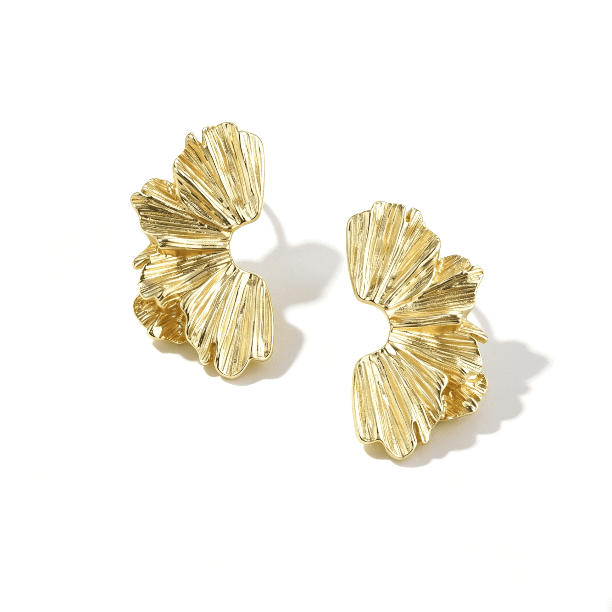 Ever P. sculptural gala jewelry style earrings with an oversized architectural silhouette.