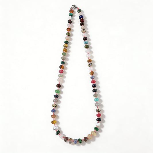 A bohemian chic stackable bracelet featuring earth-toned jasper and turquoise-style beads.