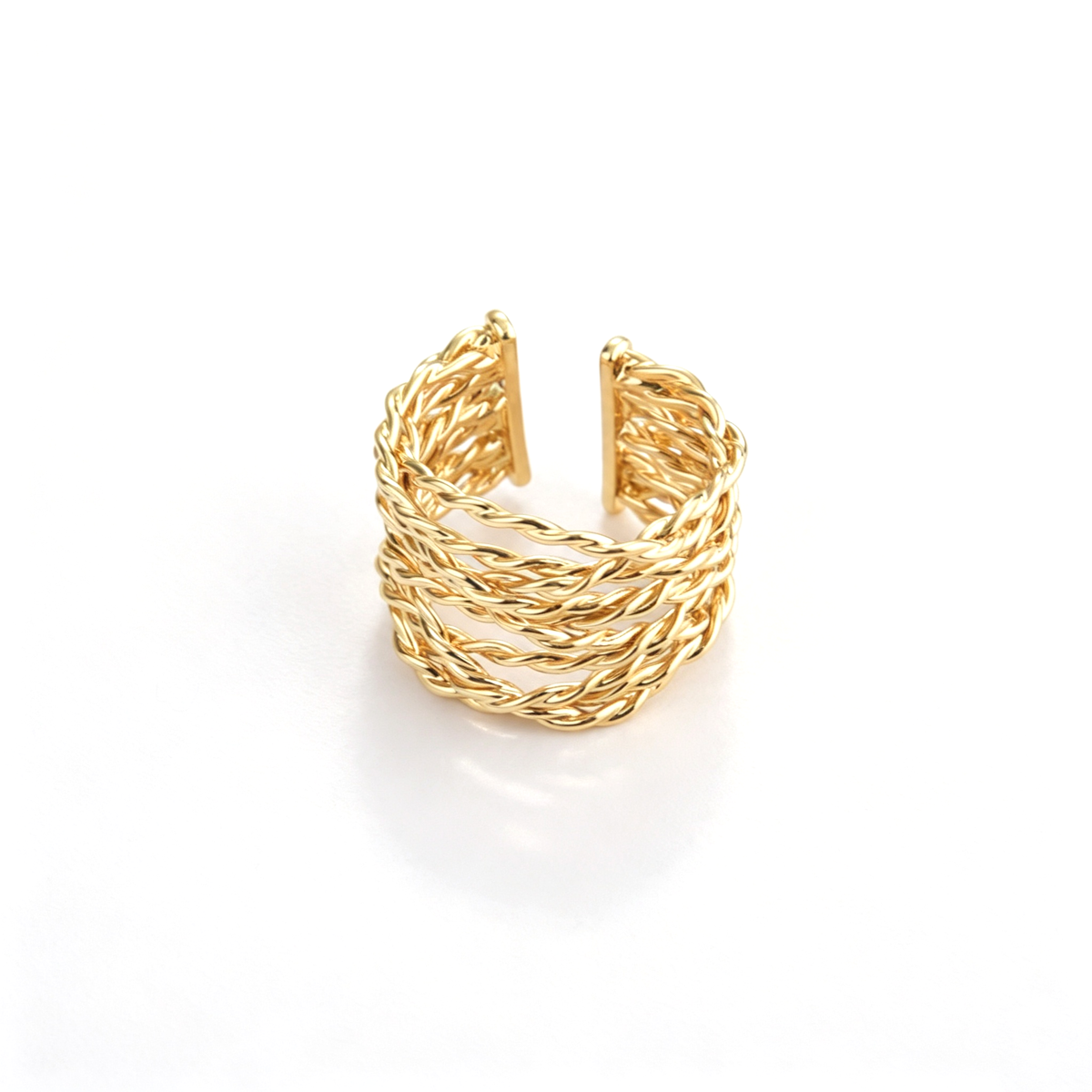 Braided open cuff ring shown from a top view with intertwined bands and open ends