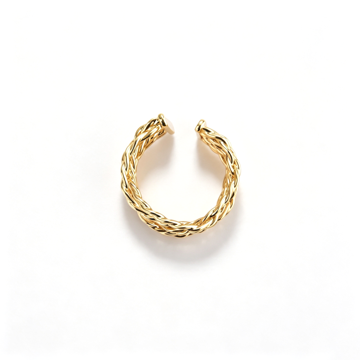 Braided cuff ring shown from an angled side view, highlighting its layered woven bands