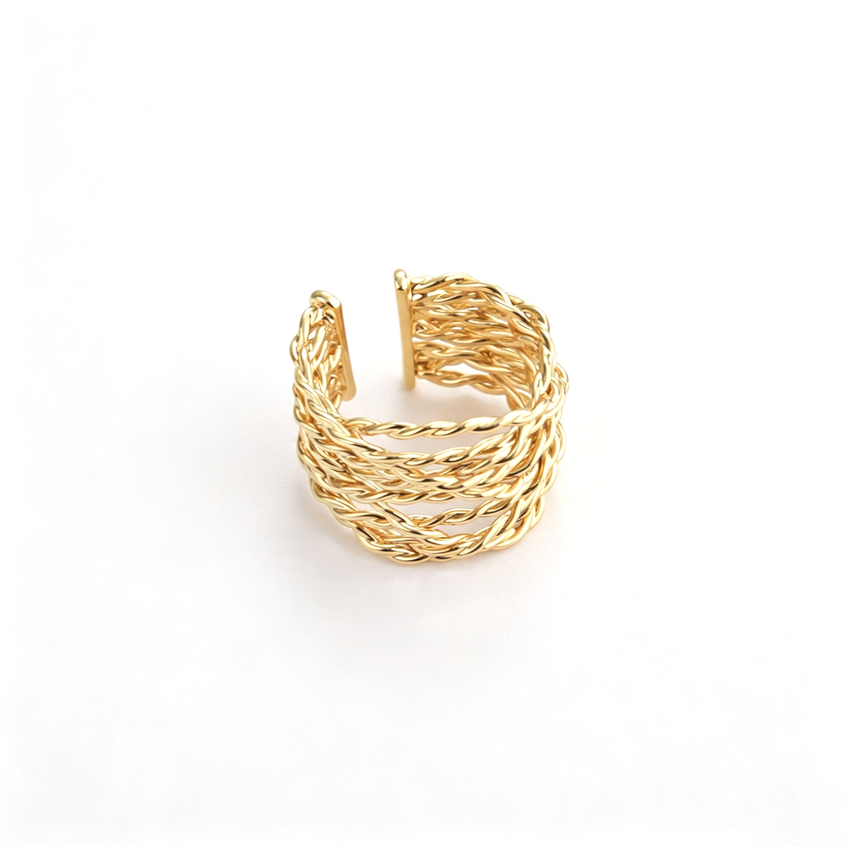 Open cuff ring viewed from the front, showing the intertwined bands and adjustable opening