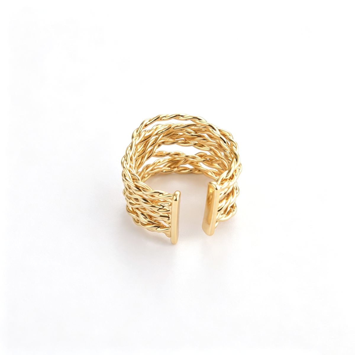 Braided open ring shown from a three-quarter view with layered bands and exposed ends