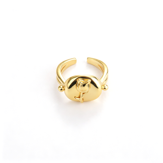Cat cuff ring with a sculptural cat figure and rounded accents in an angled front view