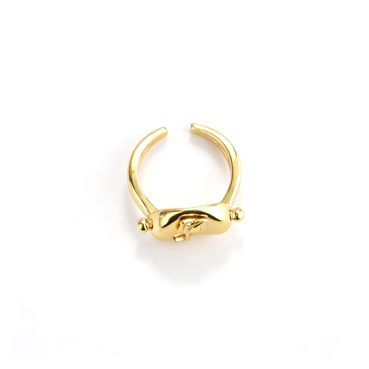 Open cuff ring shown from the side, highlighting the curved band and raised cat detail