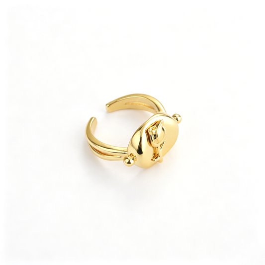 Cat cuff ring viewed from the back, showing the open band and raised center design