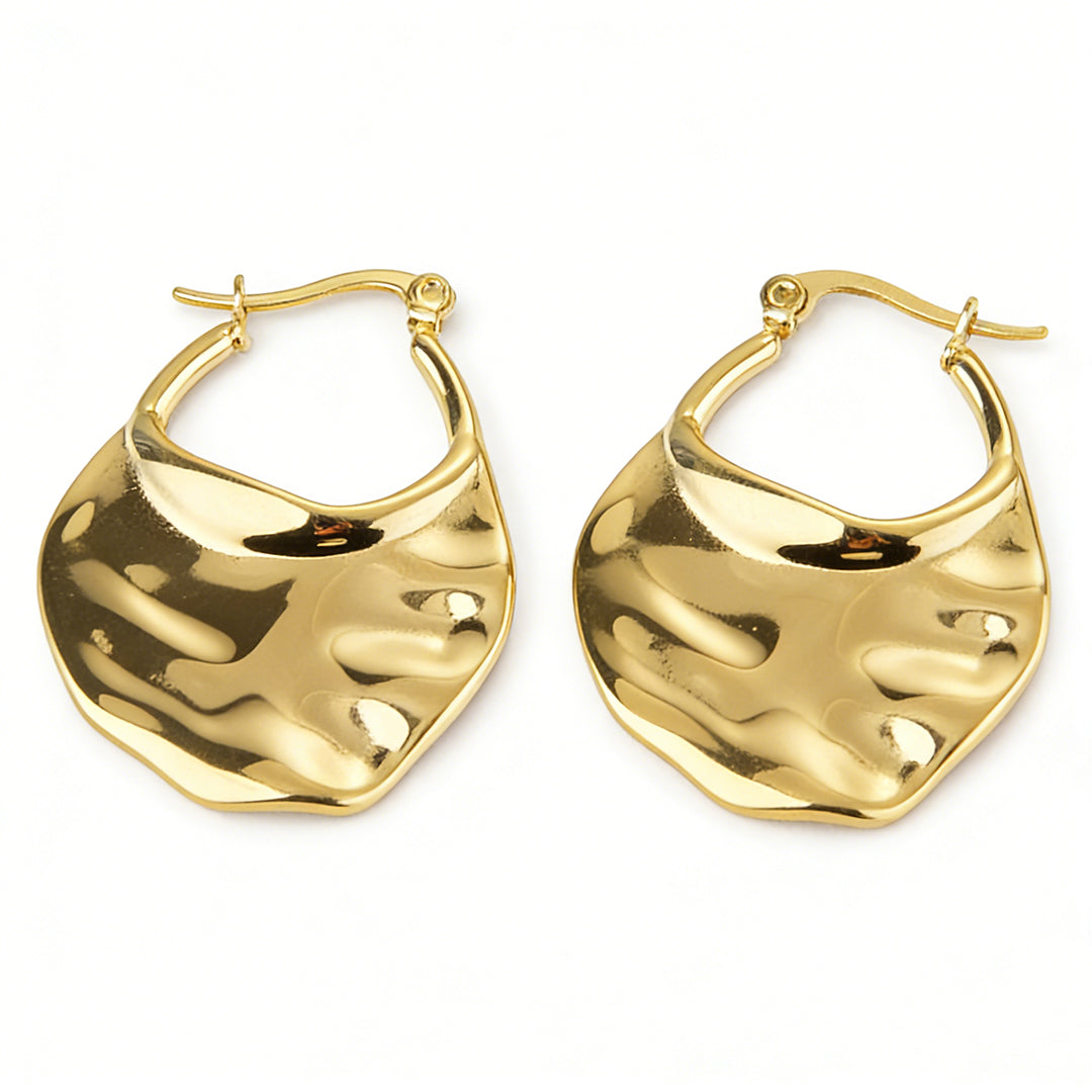A pair of chunky gold earrings in stainless steel, an ideal minimalist jewelry gift.