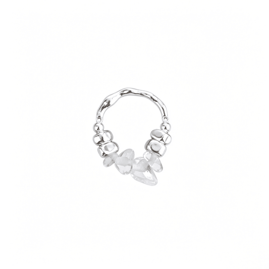 Top view of Ever P. clear quartz healing crystal stretch band ring with asymmetrical silver-toned geometric beads.