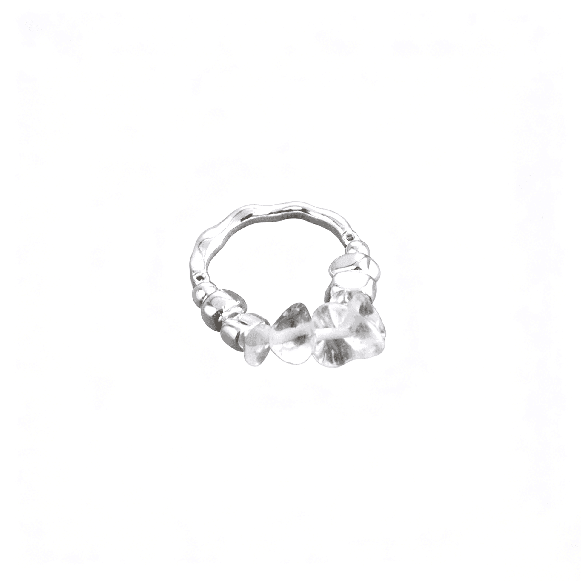 Front detailed macro shot of the geometric clear quartz statement ring showcasing its silver-plated wavy molten texture beads.