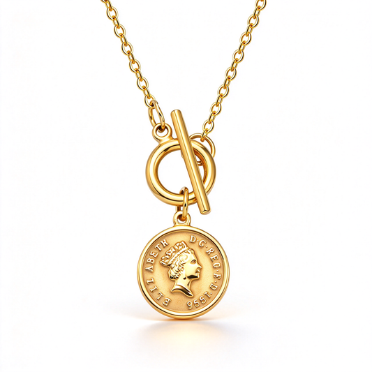 Coin pendant toggle necklace with a round portrait charm and linked chain on a white background.