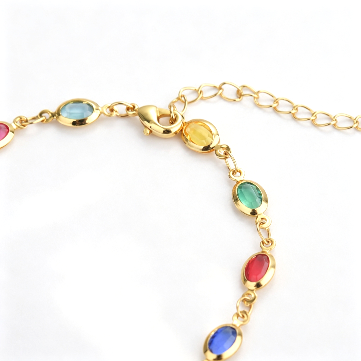 Multicolor bracelet arranged in a circle showing the repeating oval accent pattern