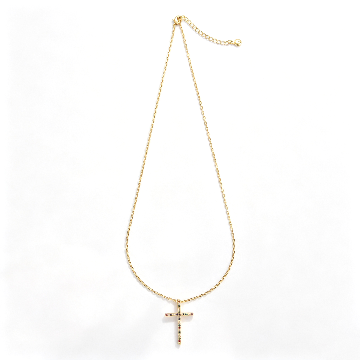 Colorful cross pendant necklace shown in a close-up of the clasp and extension chain