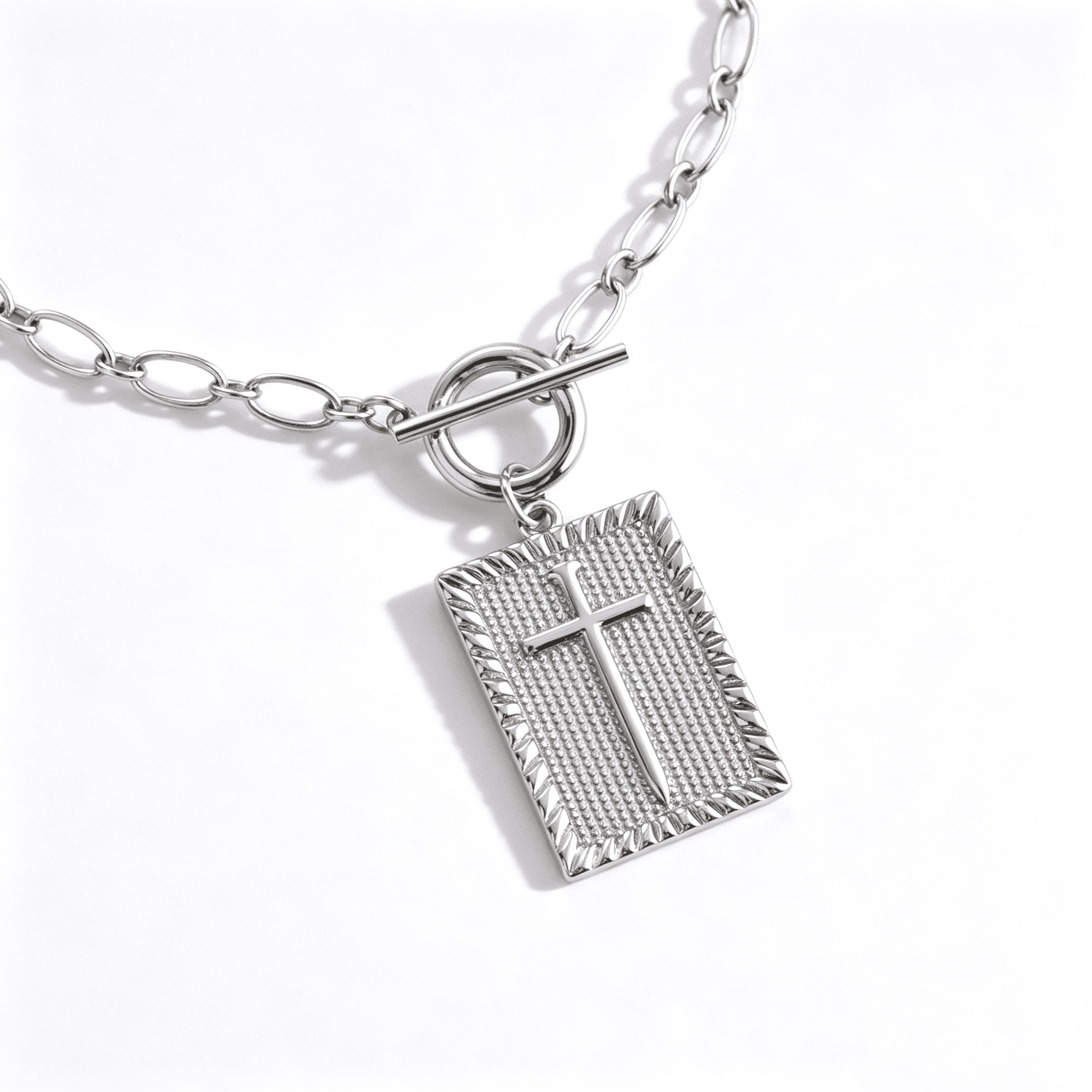 Sliver plated cross necklace for women with a minimalist 3D cube design and cross chain.