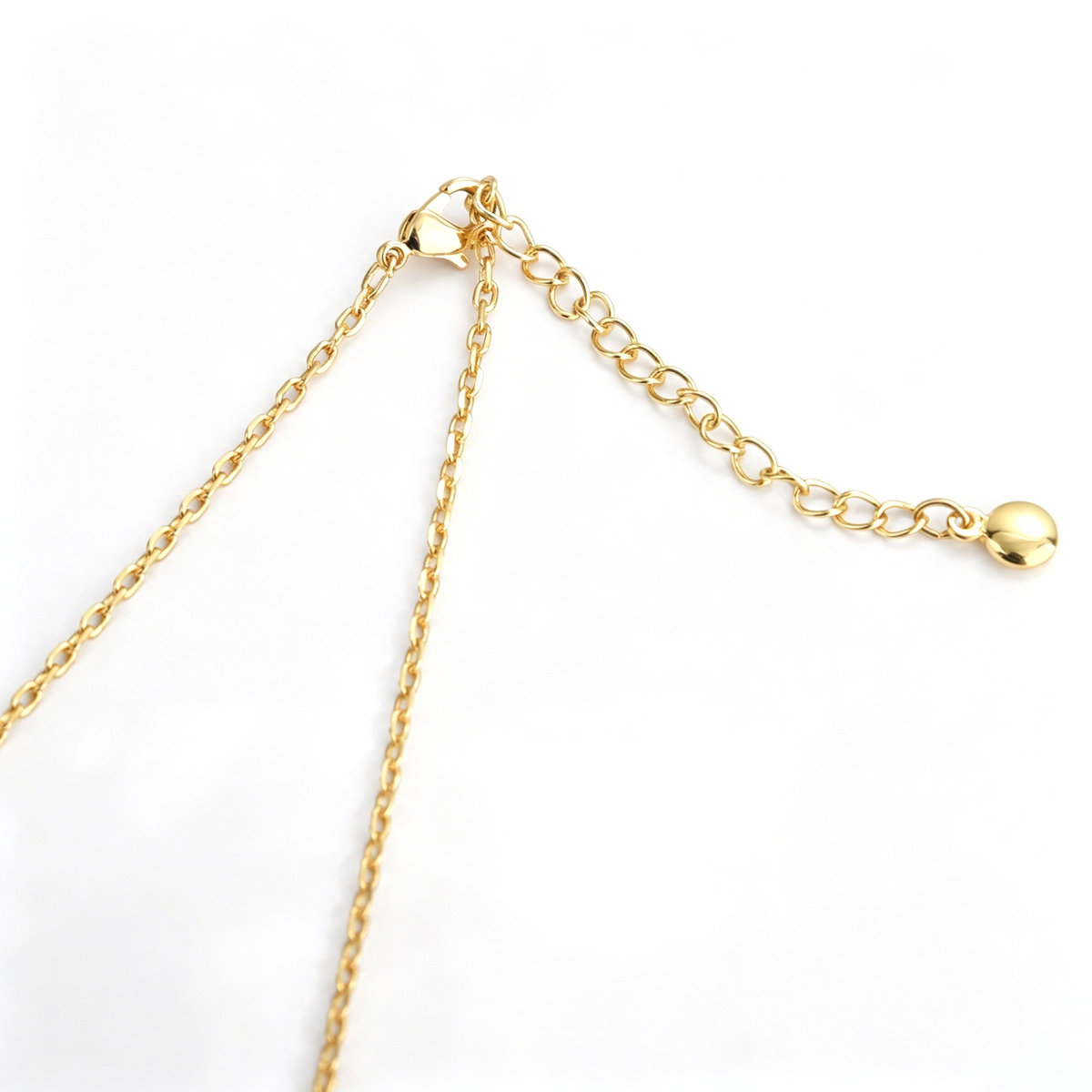 Cross pendant necklace shown from the front with the clear-accented cross pendant