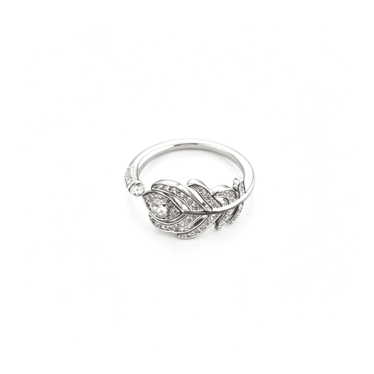 Three-quarter studio view of the silver-plated feather bypass adjustable ring wrapping gracefully around with dense CZ pave.