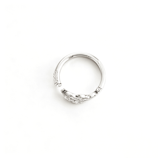 Underneath profile of the open-ended bypass plume ring showing the smooth polished interior band and overlapping wrap style.